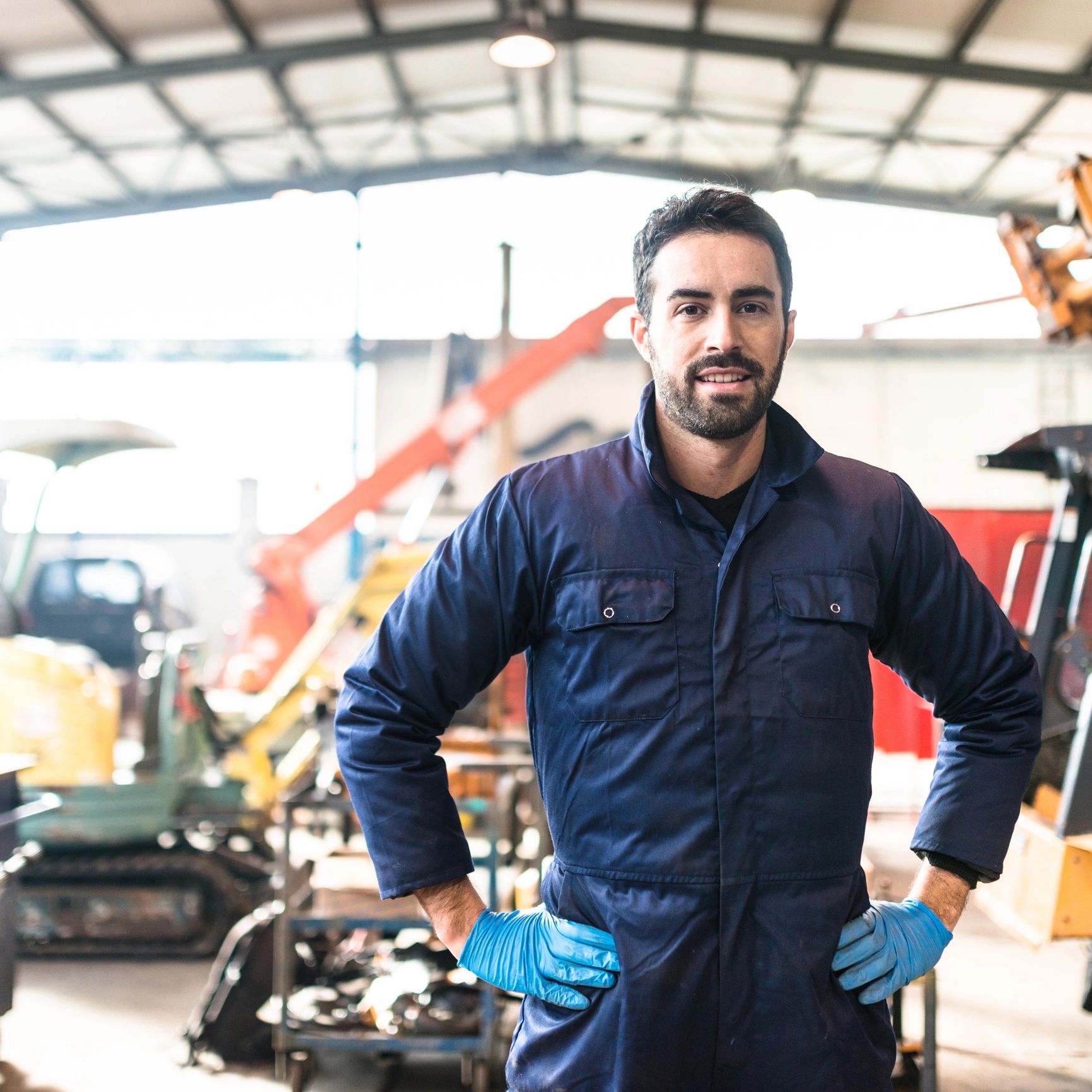 Workshop team member portrait in garage